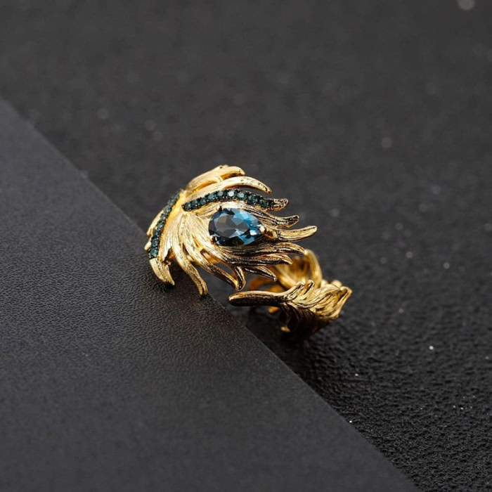 Golden Feder Ring mit Topas