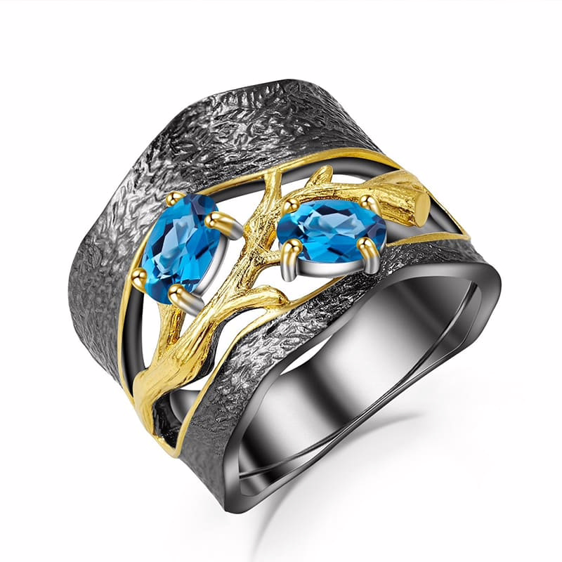 Breiter Schwarze Ring mit London Blue Topas