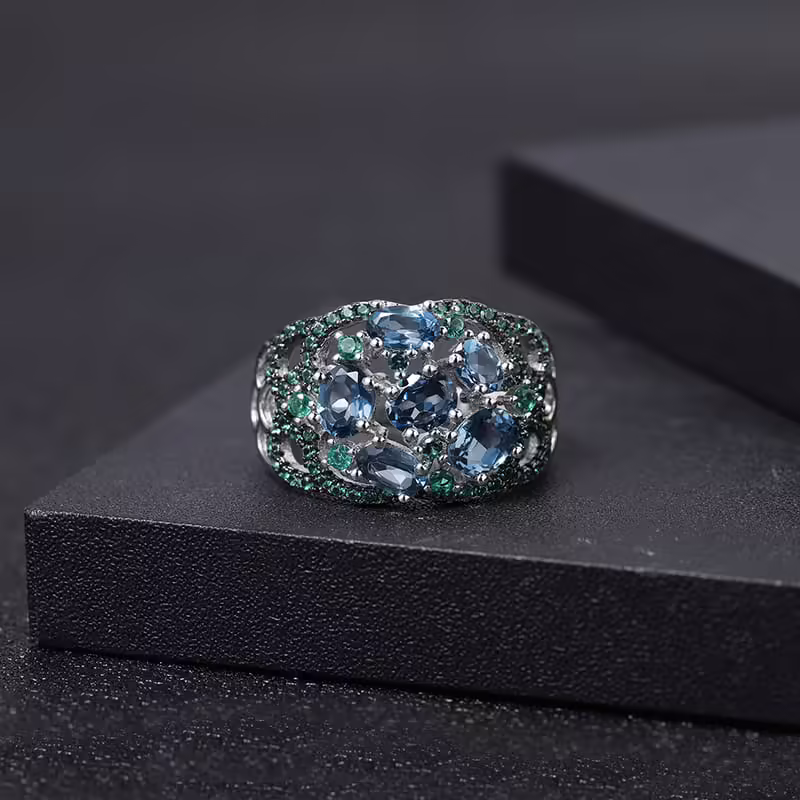 Breiter Ring mit London Blue Topas
